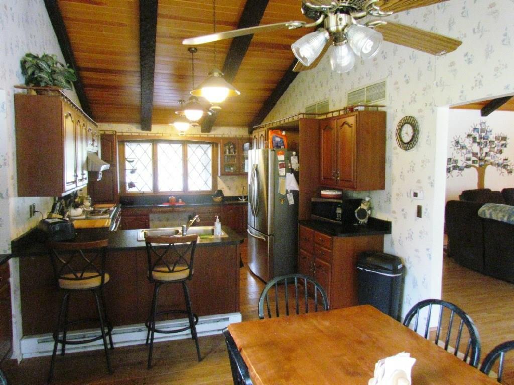 878 River Road North Anson, ME 04958 - Photo 10 of 36 Dining room & kitchen