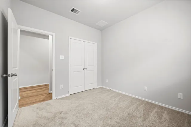 wooden floor and window in a room