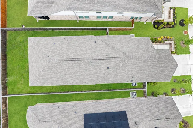 a view of a sign board with a yard