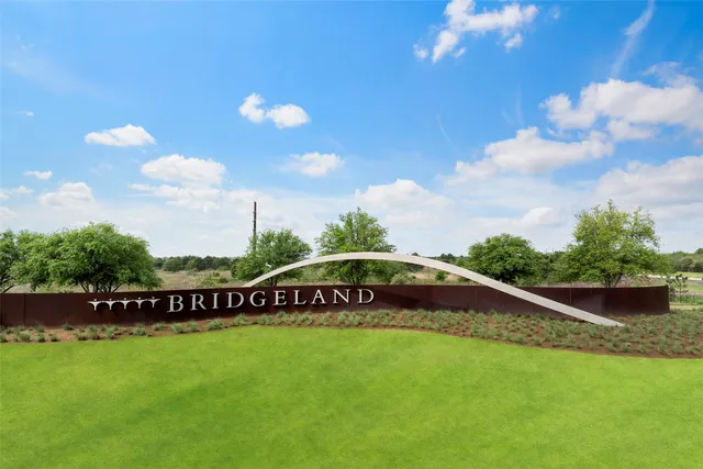 a sign on the side of the road