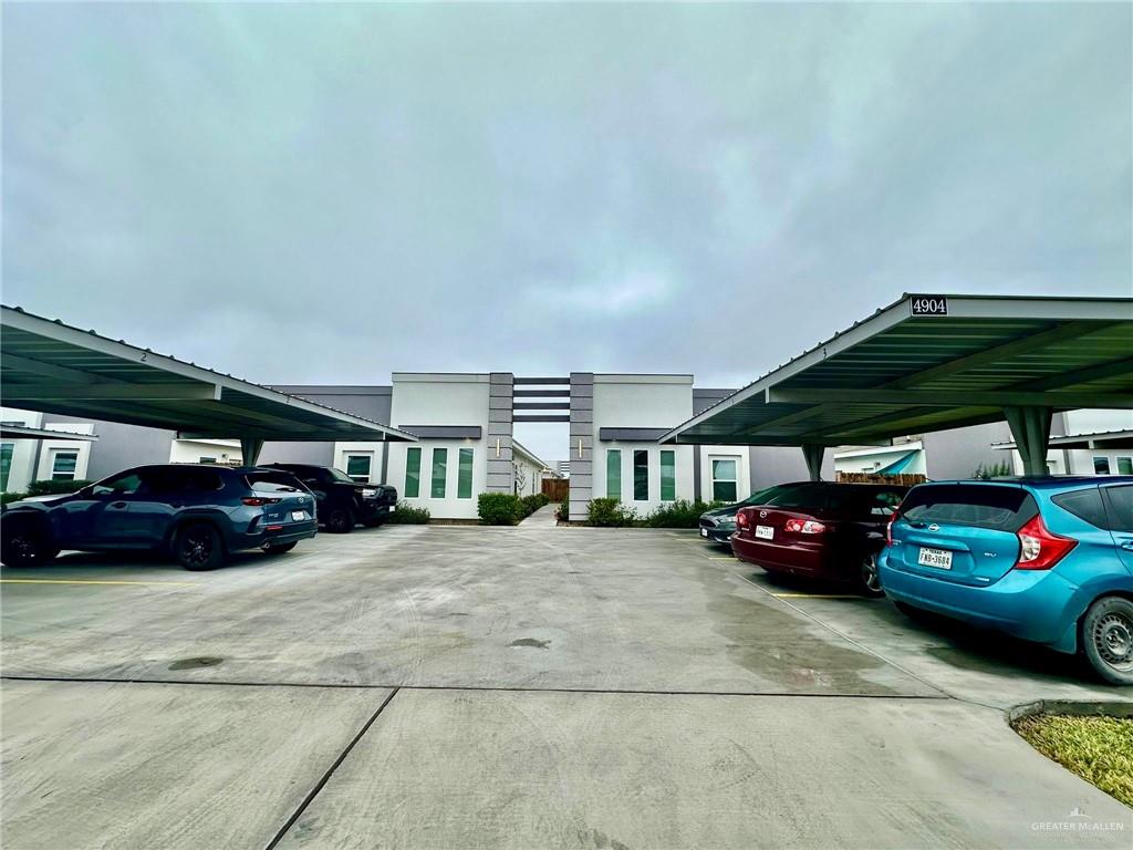 4904 North Crown Point, Unit 1 Pharr, TX 78577 - Photo 1 of 22 a view of parking garage with cars parked