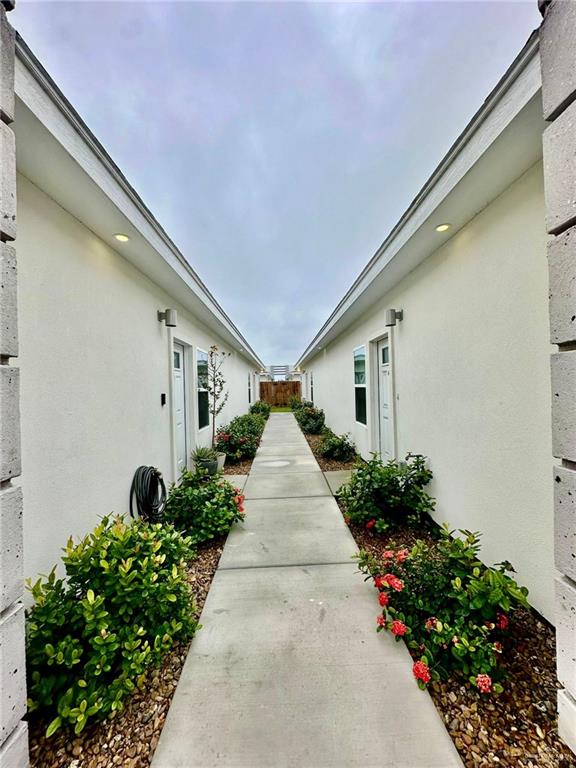 4904 North Crown Point, Unit 1 Pharr, TX 78577 - Photo 2 of 22 a view of a garden with pathway