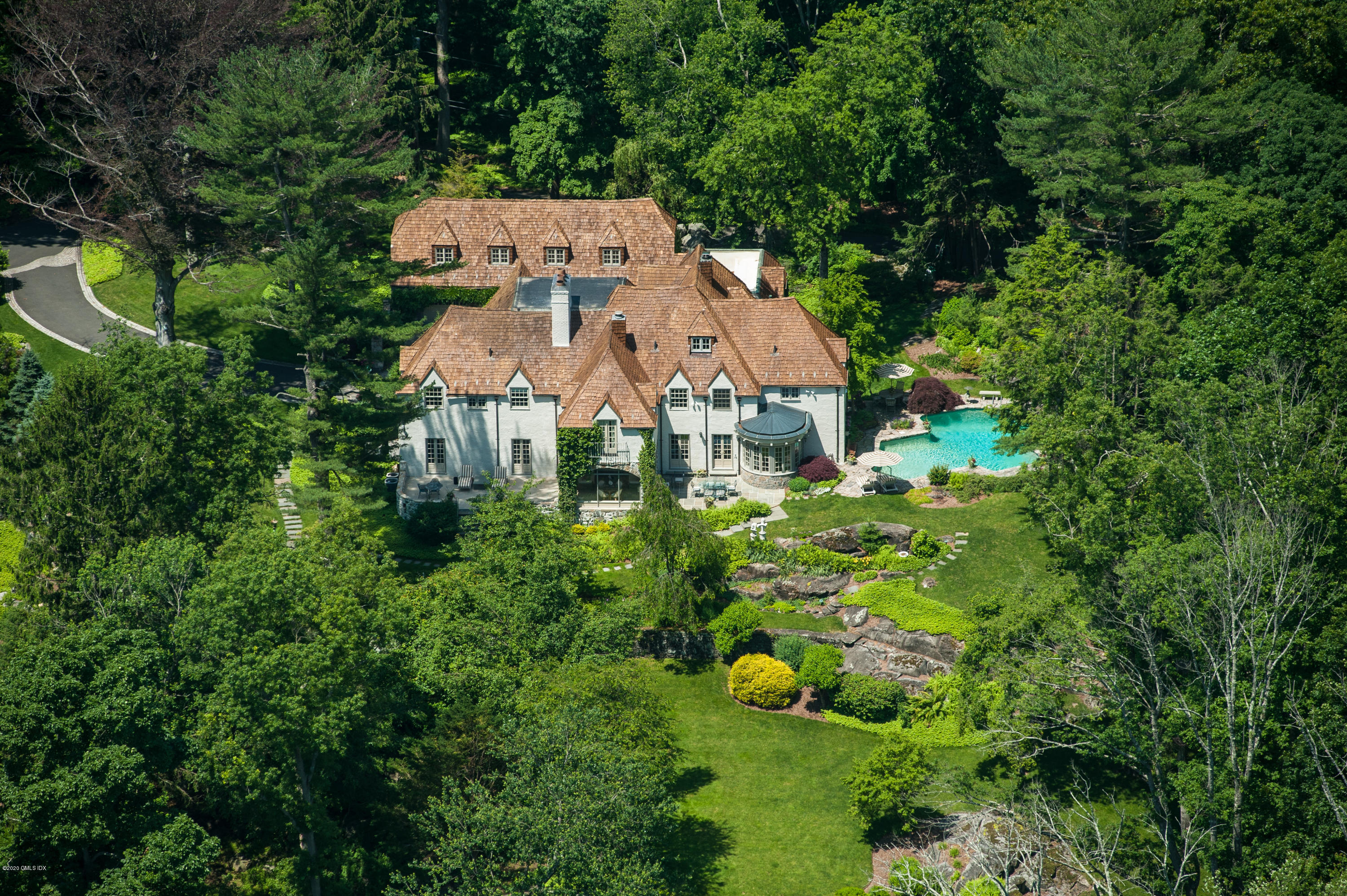 22 Frost Road Greenwich, CT 06830 - Photo 1 of 1 an aerial view of a house with swimming pool and garden