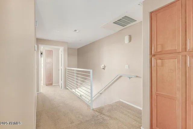 a view of a livingroom with staircase