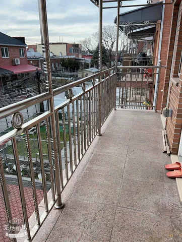 a view of a balcony with city view