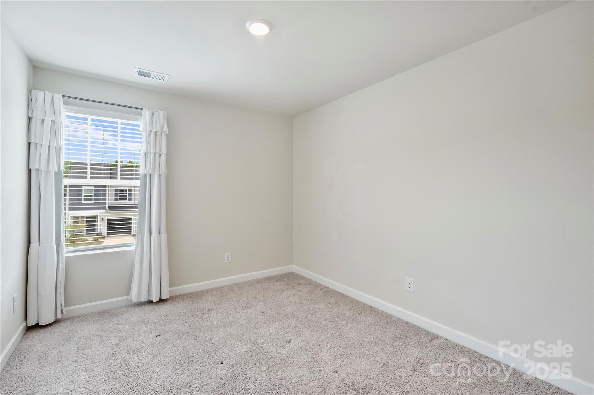 502 Tayberry Lane Fort Mill, SC 29715 - Photo 30 of 39 an empty room with a window