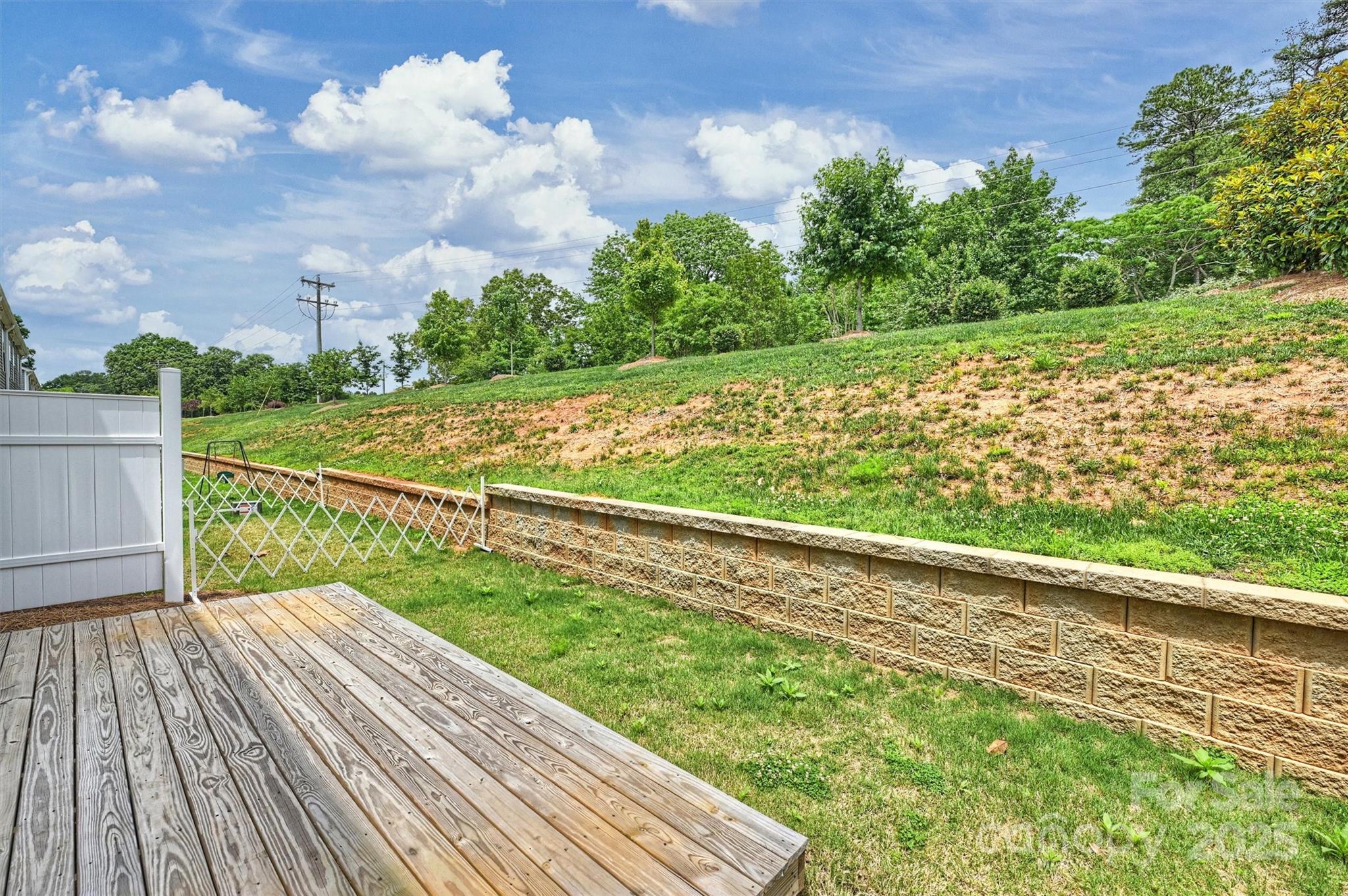 502 Tayberry Lane Fort Mill, SC 29715 - Photo 33 of 39 a view of a yard with wooden floor