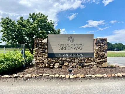 a sign on the side of a road