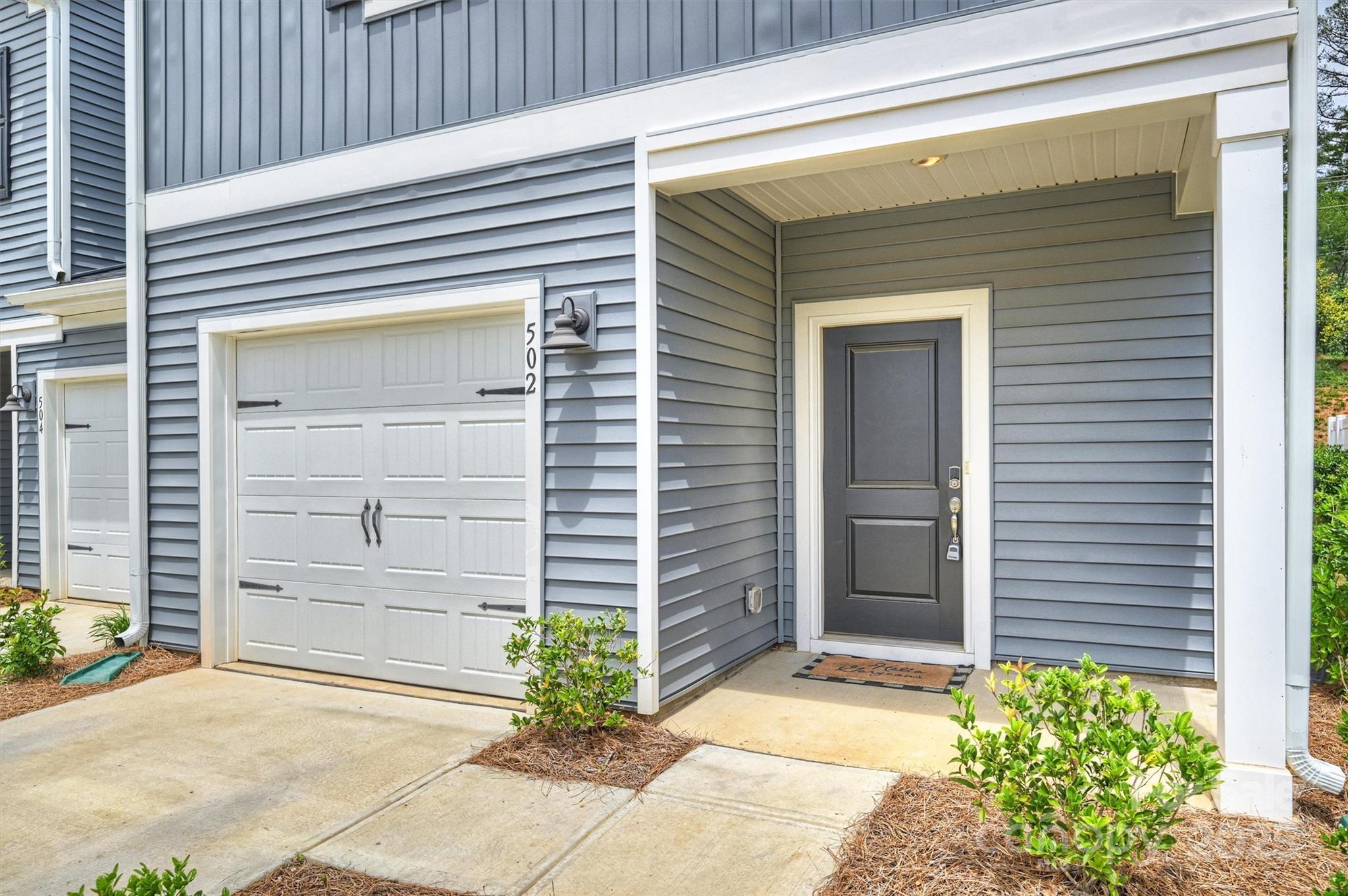 502 Tayberry Lane Fort Mill, SC 29715 - Photo 5 of 39 a front view of a house with a garage