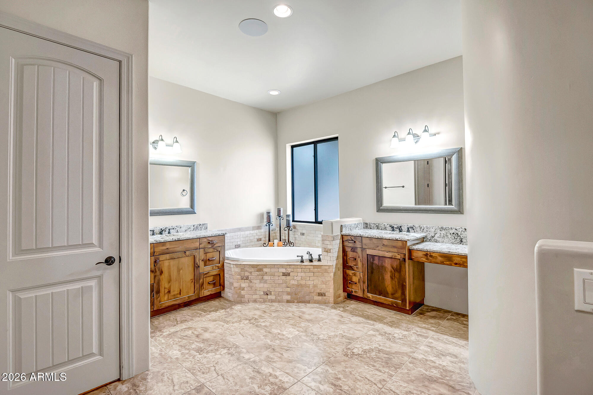 1121 East Saddle Mountain Road Phoenix, AZ 85086 - Photo 18 of 49 a spacious bathroom with a tub double sink and a mirror