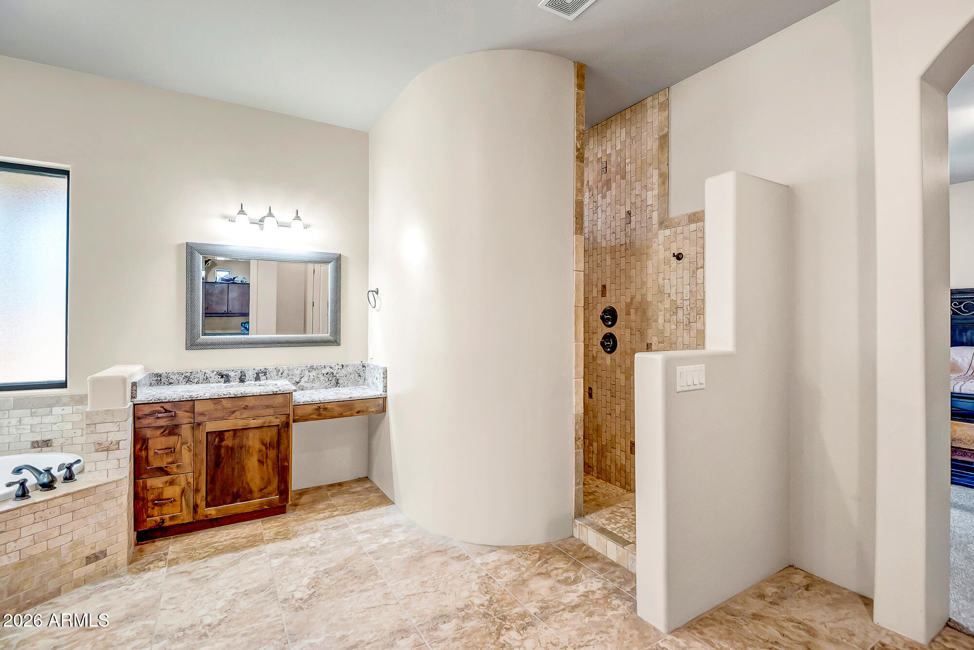 1121 East Saddle Mountain Road Phoenix, AZ 85086 - Photo 20 of 49 a bathroom with a sink and a mirror