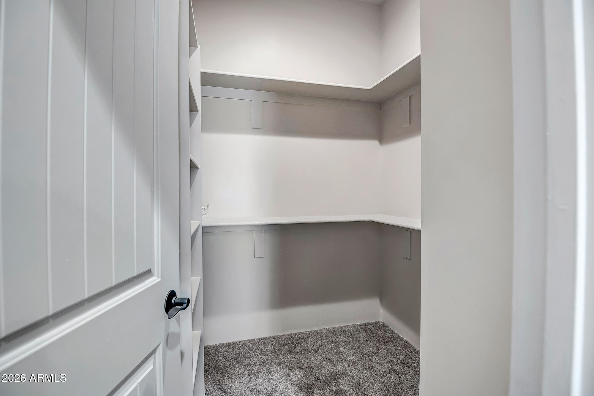 1121 East Saddle Mountain Road Phoenix, AZ 85086 - Photo 47 of 49 a view of an empty walk in closet