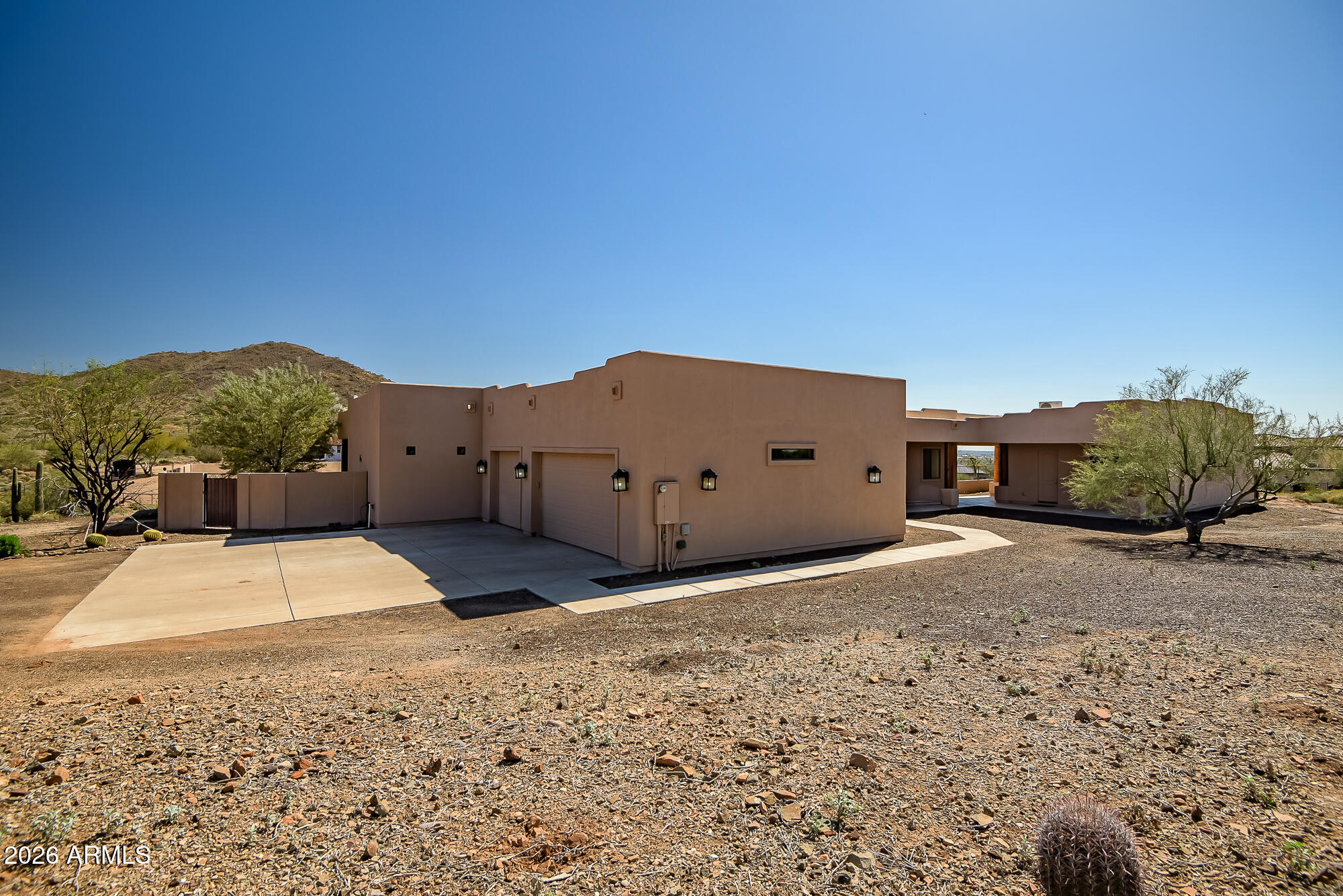 1121 East Saddle Mountain Road Phoenix, AZ 85086 - Photo 6 of 49 a house view with a backyard space