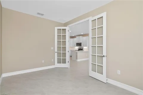a view of empty room with front door