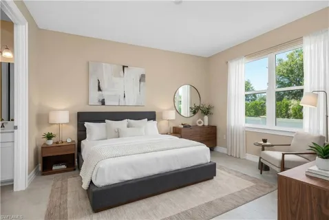 a bedroom with bed and a large window