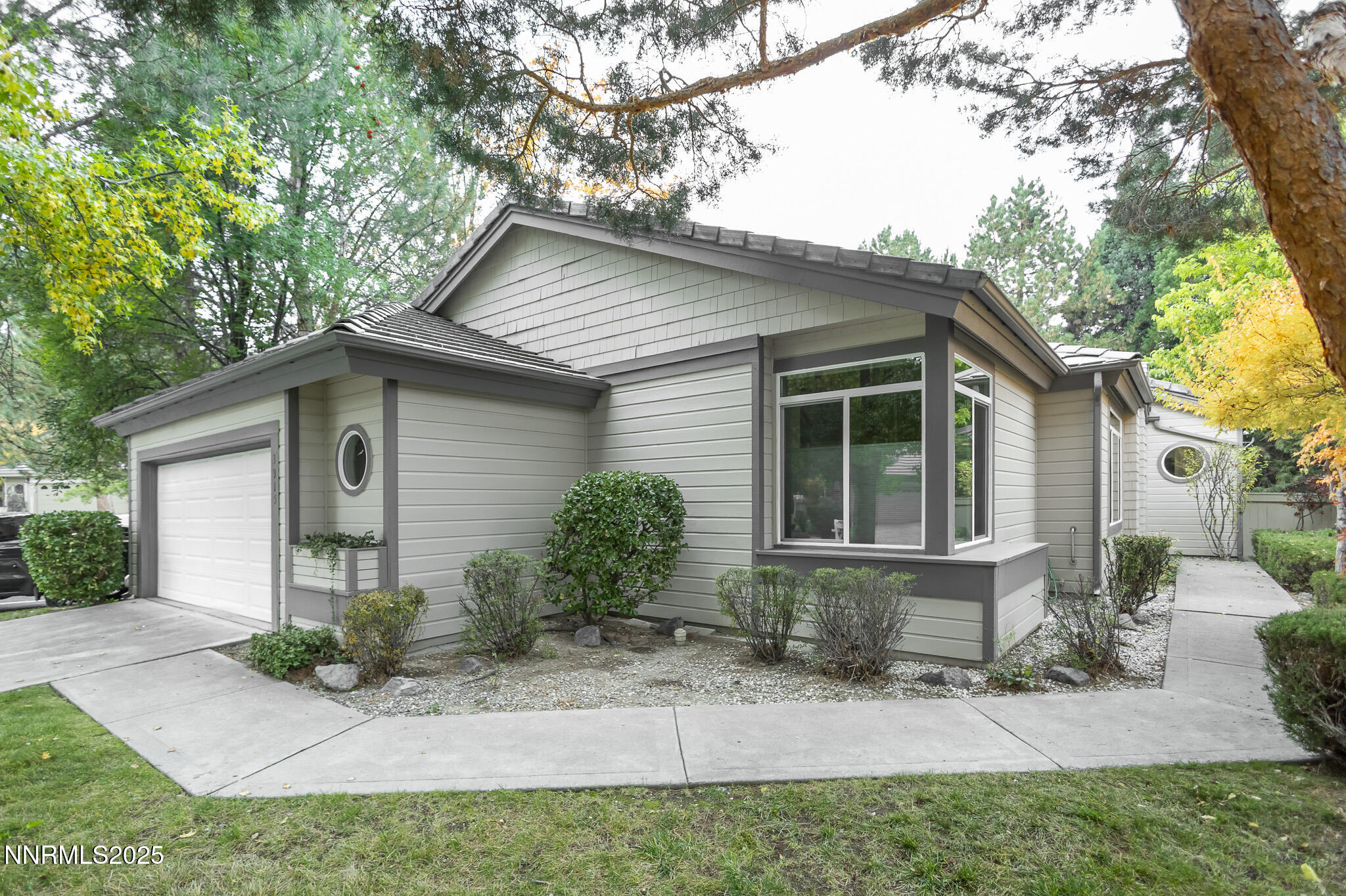 3915 Innsbruck Court Reno, NV 89519 - Photo 2 of 59 a front view of a house with garden