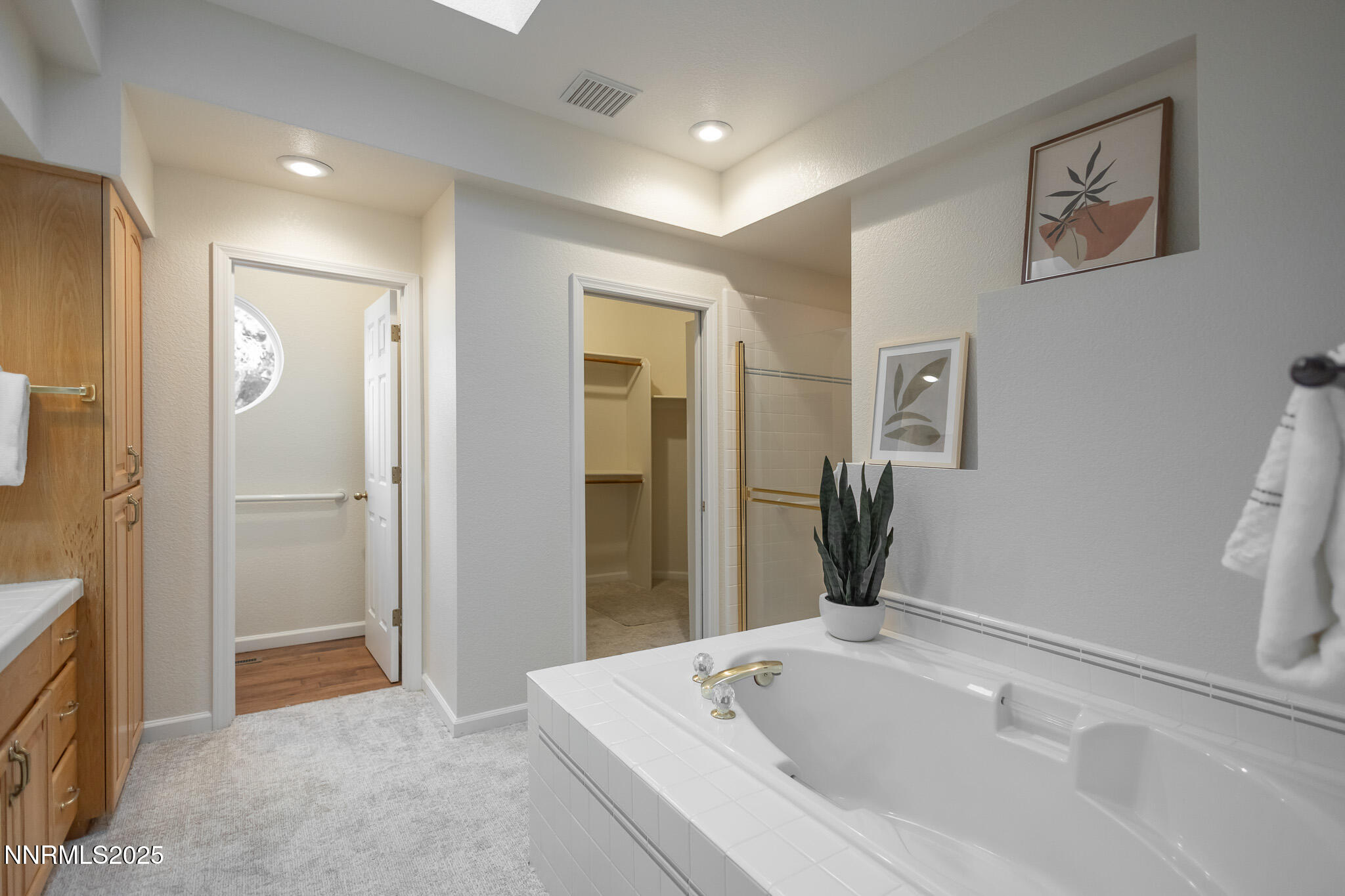 3915 Innsbruck Court Reno, NV 89519 - Photo 26 of 59 a bathroom with a bathtub and a sink