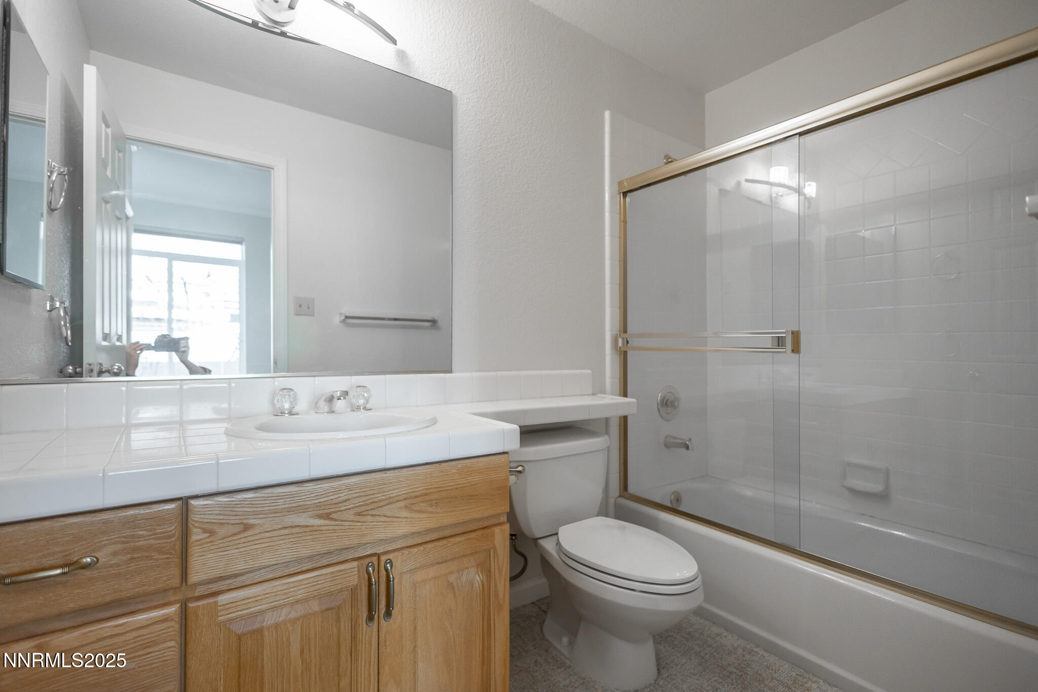 3915 Innsbruck Court Reno, NV 89519 - Photo 38 of 59 a bathroom with a sink a toilet and shower