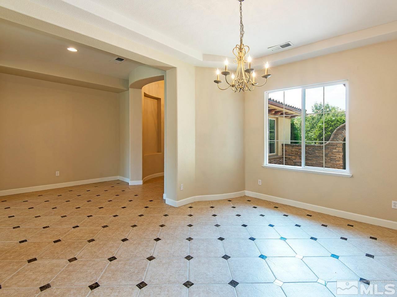 9980 Burghley Lane Reno, NV 89521 - Photo 5 of 24 a view of a bathroom with a shower