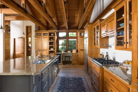 a kitchen with granite countertop lots of counter top space