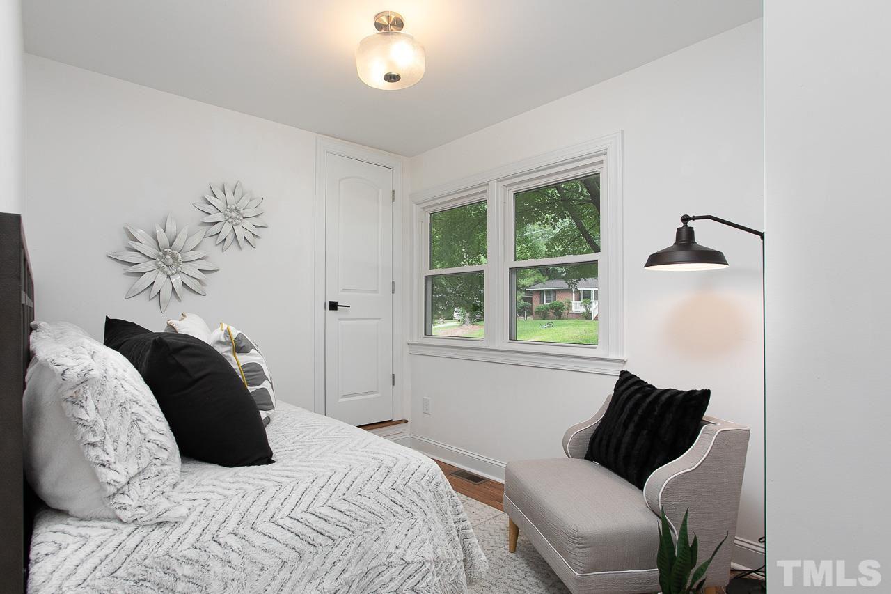 905 Chatham Lane Raleigh, NC 27610 - Photo 15 of 30 Owners used this as an office, but it is staged as a small bedroom with a daybed.