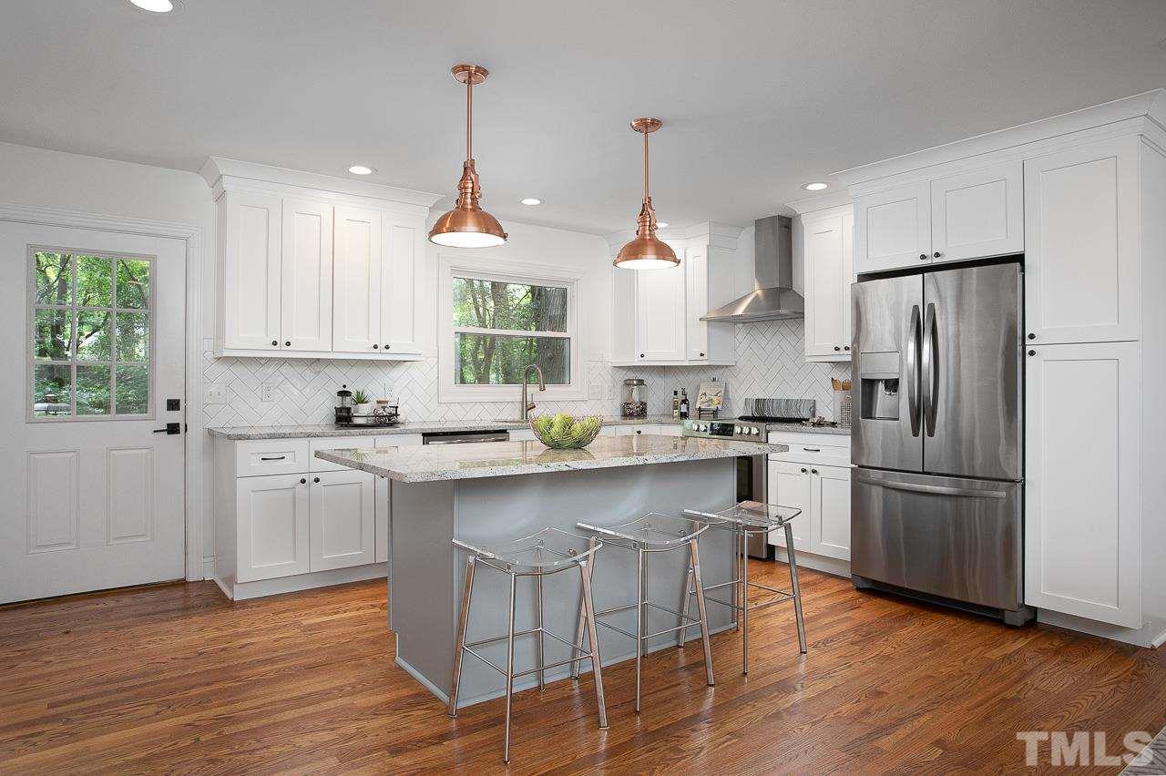 905 Chatham Lane Raleigh, NC 27610 - Photo 7 of 30 Extra flexible space in room can be used as a kitchen or dining room.