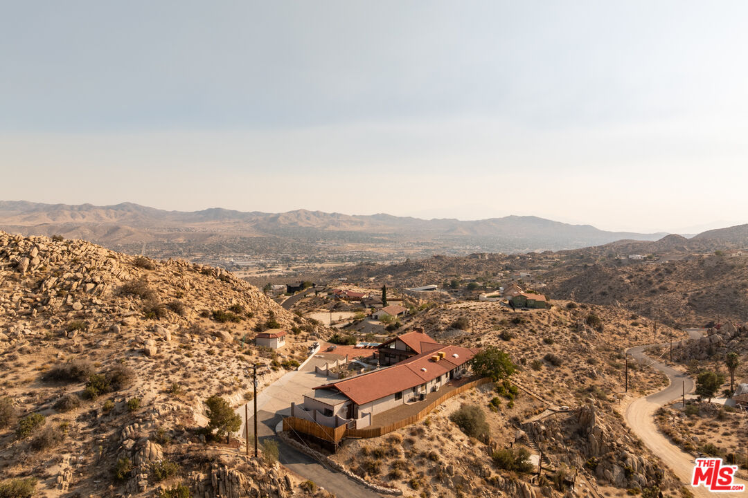57387 San Juan Road Yucca Valley, CA 92284 - Photo 3 of 32 an aerial view of residential house and residential space