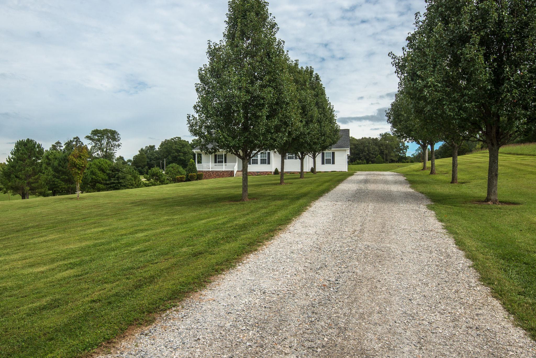 911 Franklin Road Charlotte, TN 37036 - Photo 24 of 30 Gorgeous Trees Line the Driveway