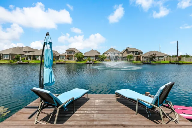 a lake view with a sitting space and lake view