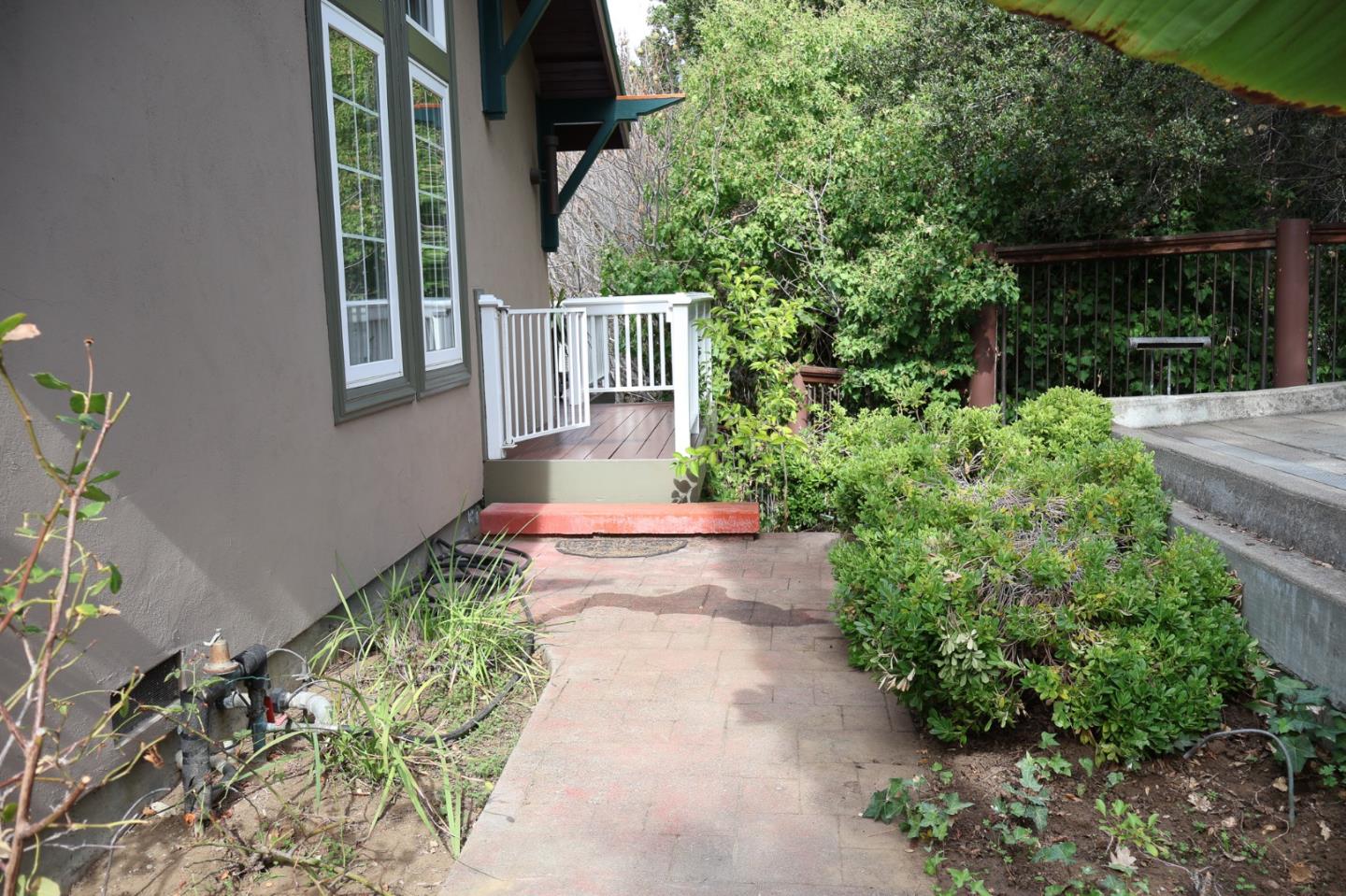 2360 Woodside Road, Unit A Woodside, CA 94062 - Photo 13 of 27 a view of a pathway with flower plants
