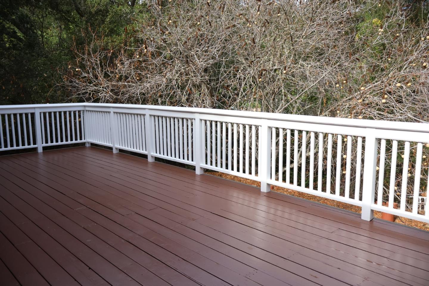 2360 Woodside Road, Unit A Woodside, CA 94062 - Photo 14 of 27 a view of a balcony with wooden floor