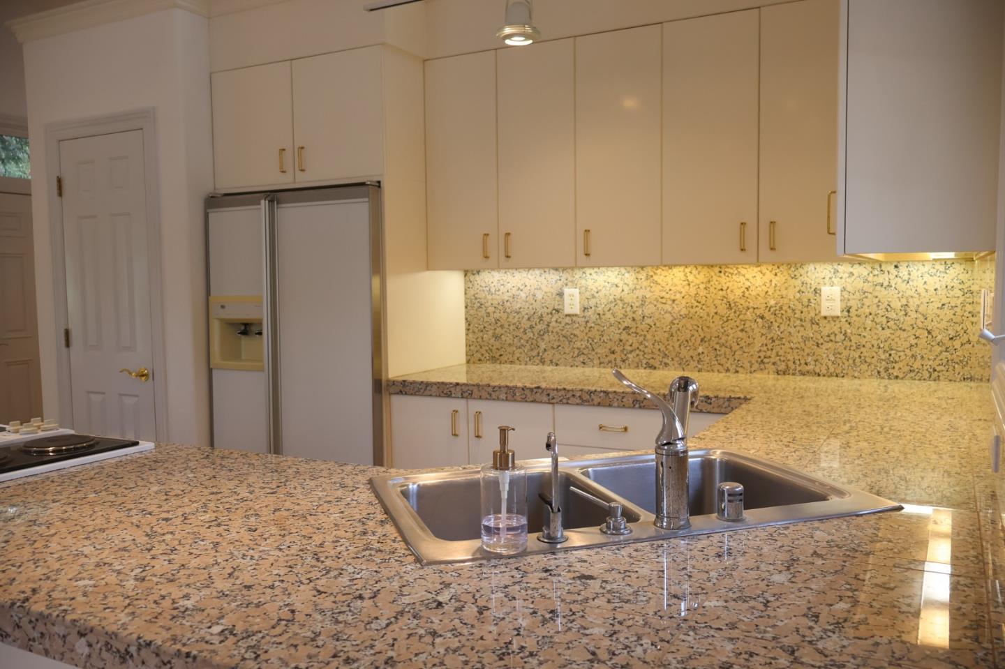 2360 Woodside Road, Unit A Woodside, CA 94062 - Photo 16 of 27 a bathroom with a sink and a bathtub