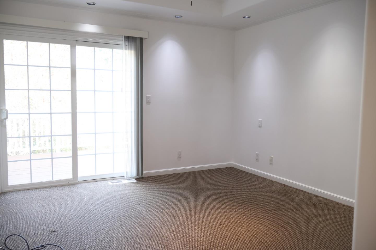 2360 Woodside Road, Unit A Woodside, CA 94062 - Photo 20 of 27 an empty room with a window