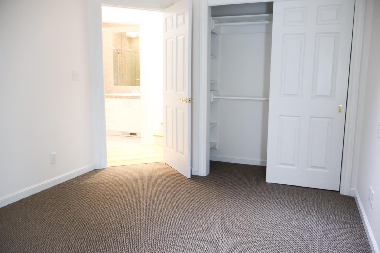 2360 Woodside Road, Unit A Woodside, CA 94062 - Photo 22 of 27 a view of an empty room with a window