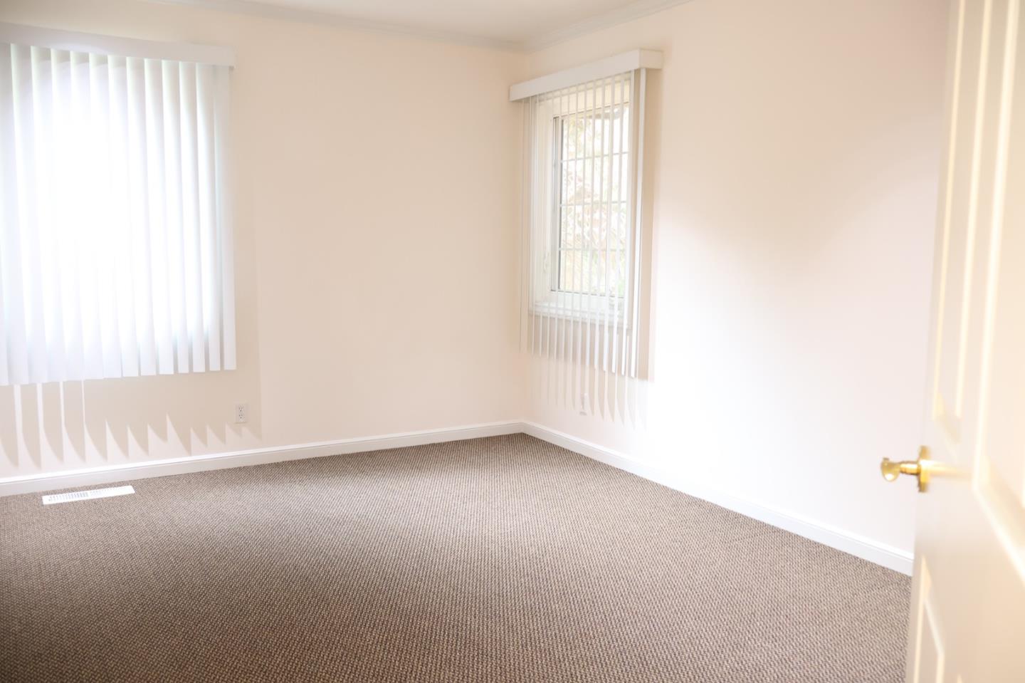 2360 Woodside Road, Unit A Woodside, CA 94062 - Photo 23 of 27 an empty room with a window