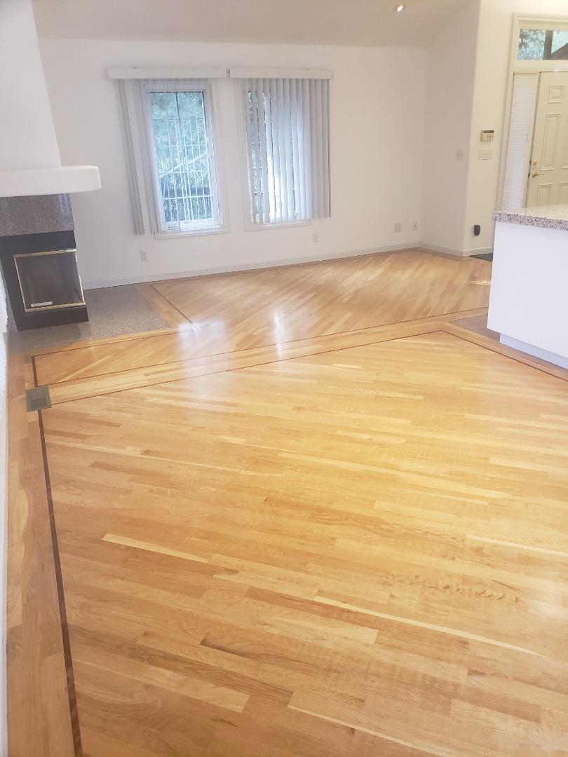 2360 Woodside Road, Unit A Woodside, CA 94062 - Photo 4 of 27 a view of an empty room with window and a kitchen