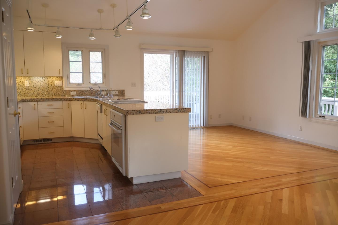 2360 Woodside Road, Unit A Woodside, CA 94062 - Photo 5 of 27 a view of a kitchen with a sink and dishwasher