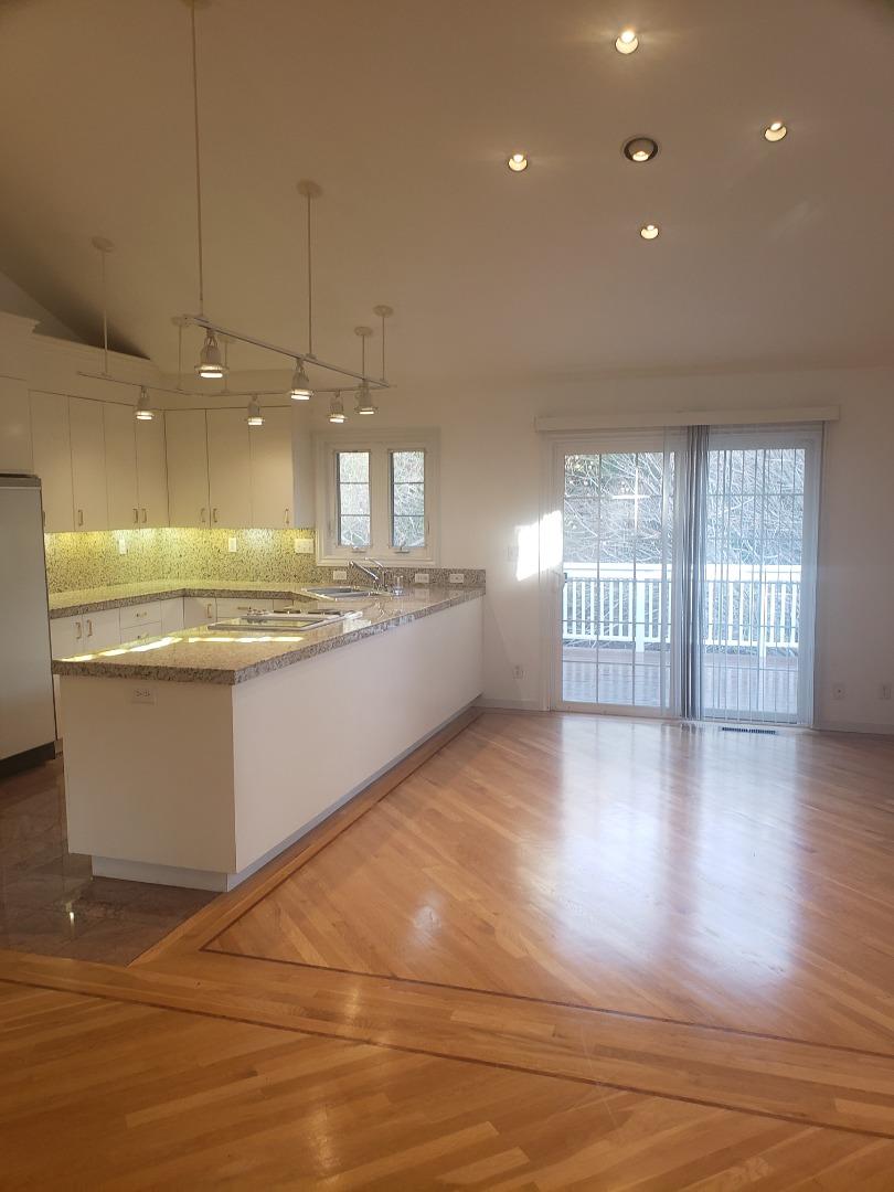 2360 Woodside Road, Unit A Woodside, CA 94062 - Photo 6 of 27 a view of a kitchen with a sink and cabinets