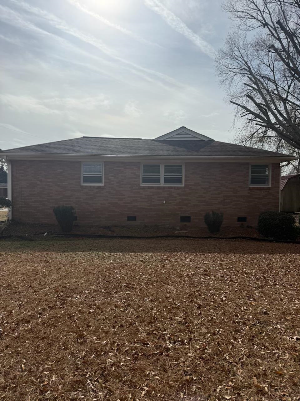 4625 Graham Street Loris, SC 29569 - Photo 5 of 11 View of home's exterior with crawl space and brick siding