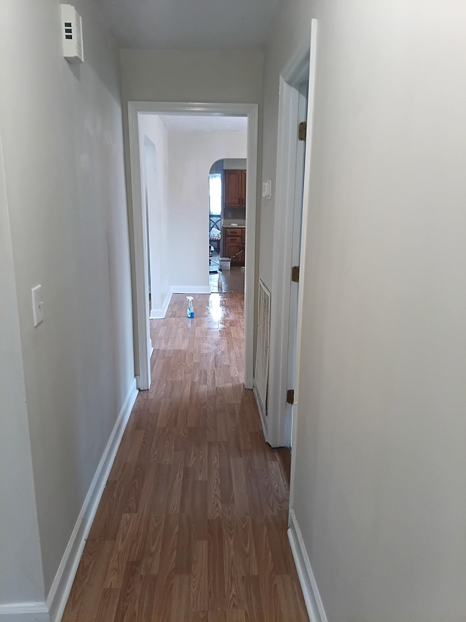 4625 Graham Street Loris, SC 29569 - Photo 10 of 11 Hall featuring dark wood-style flooring and arched walkways