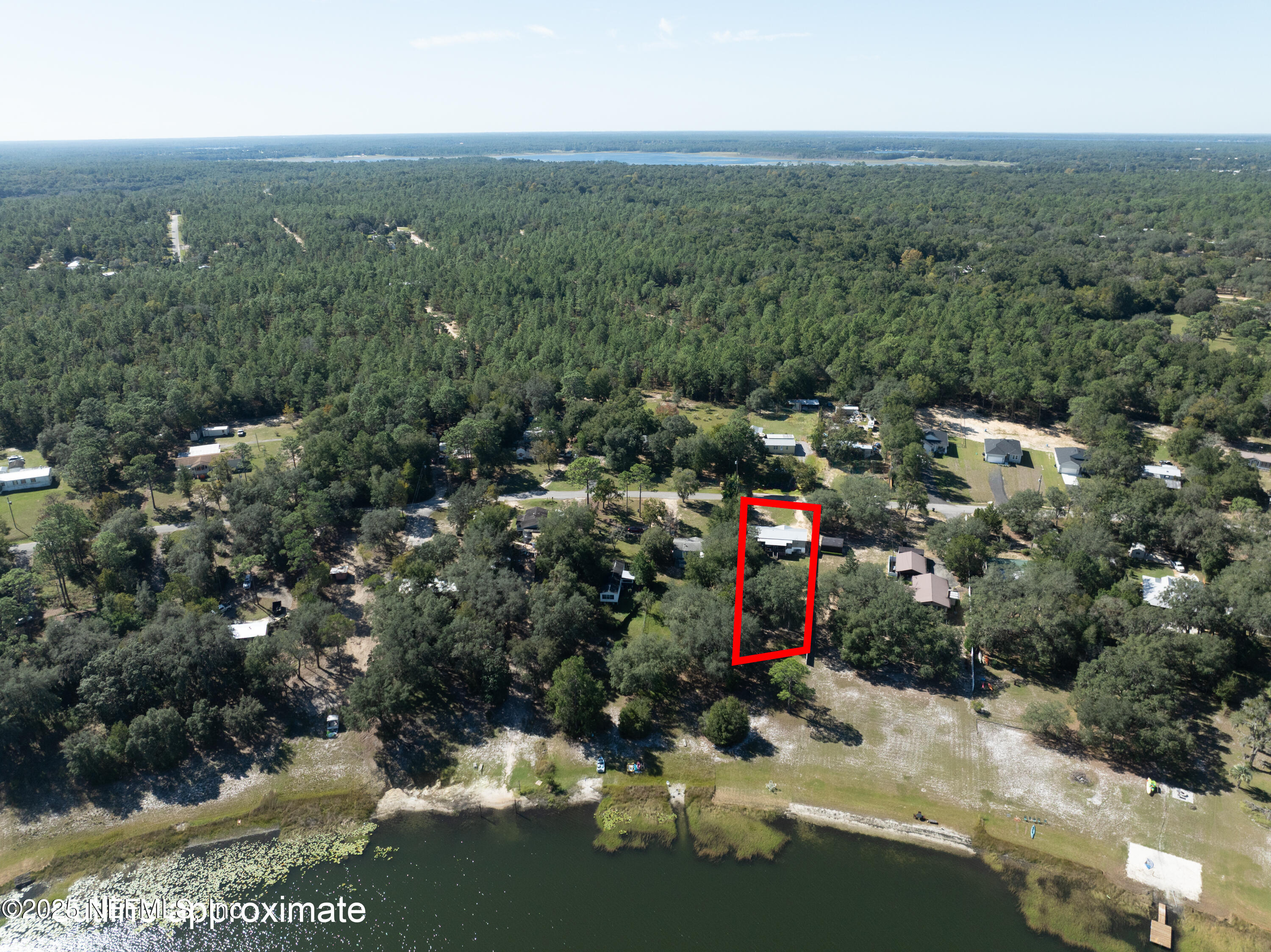 6279 Little Lake Geneva Road Keystone Heights, FL 32656 - Photo 43 of 45 an aerial view of a house with a yard