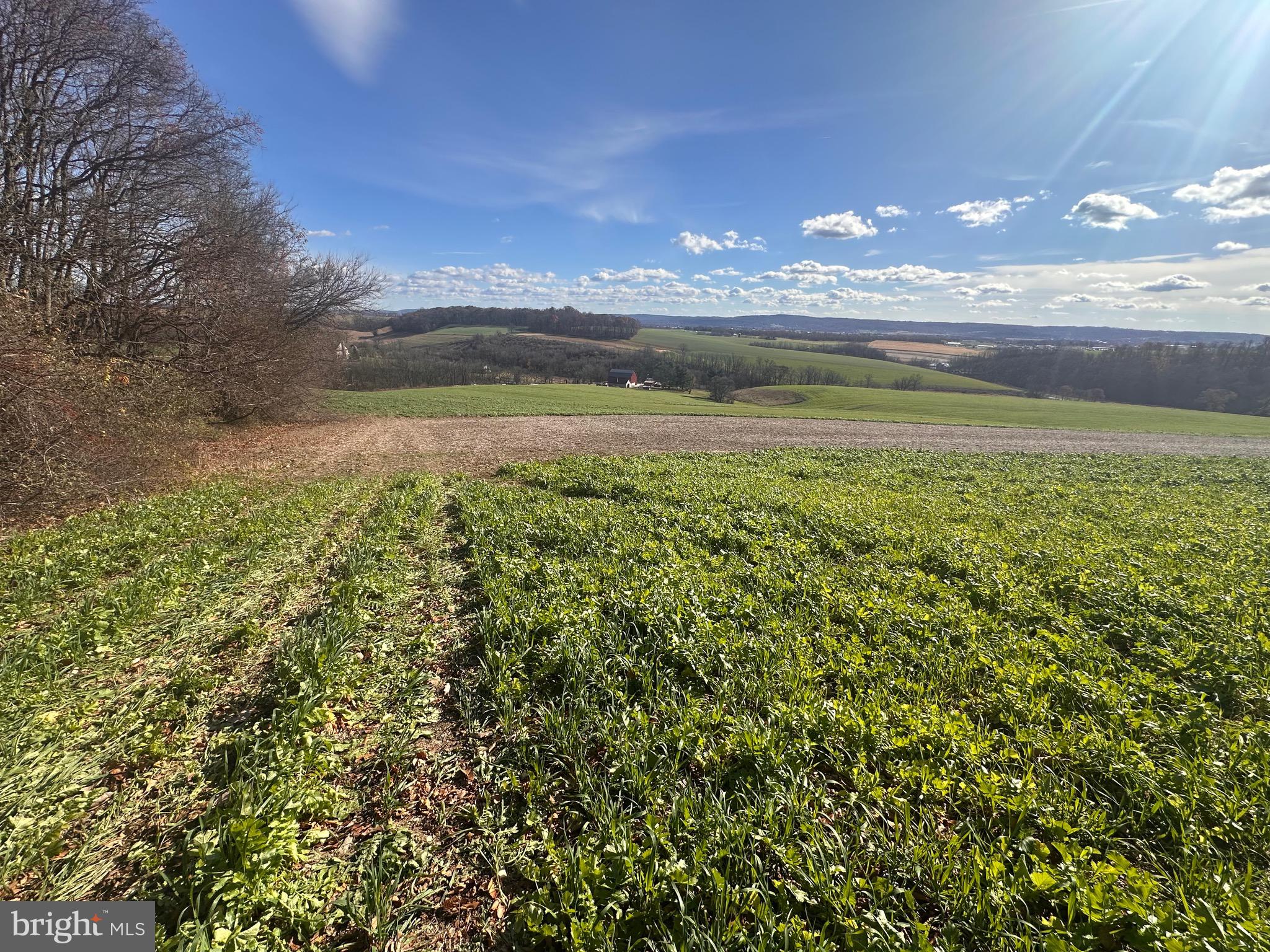 0 Siegfriedale Road Kutztown, PA 19530 - Photo 19 of 21 a view of a lake in a sunset