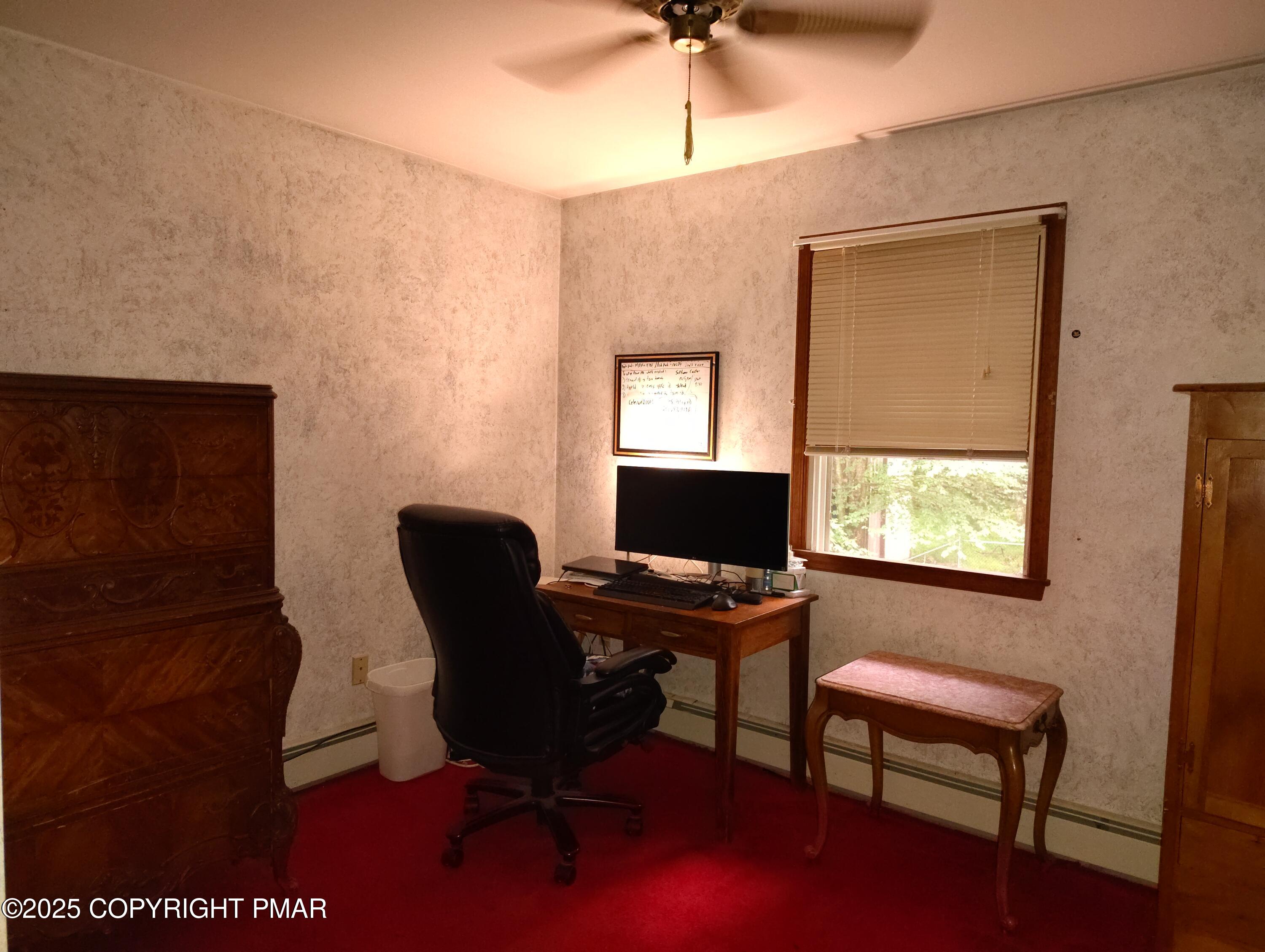 587 Long Mountain Road Effort, PA 18330 - Photo 17 of 29 a work room with furniture and a window