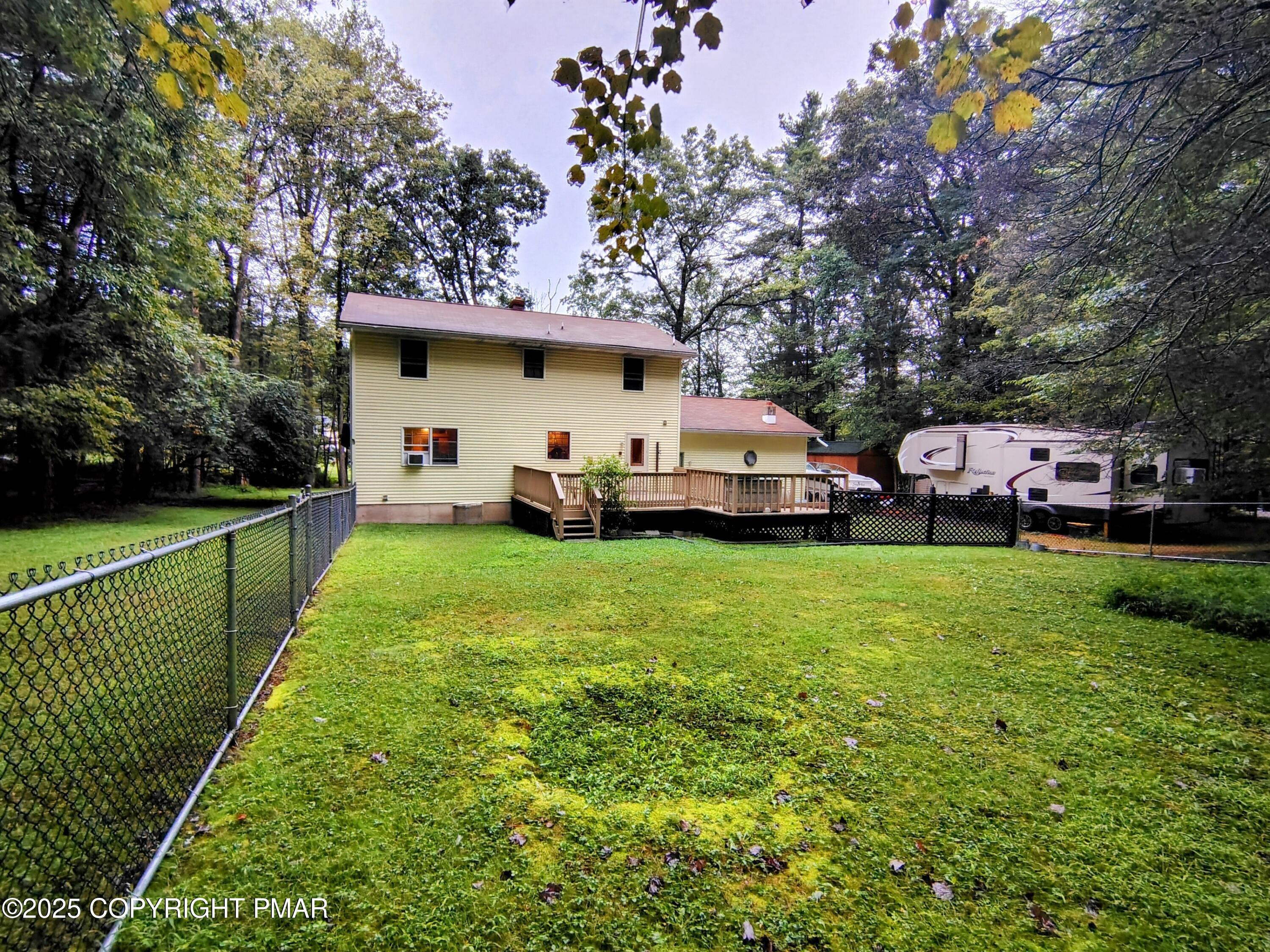 587 Long Mountain Road Effort, PA 18330 - Photo 20 of 29 a front view of a house with garden