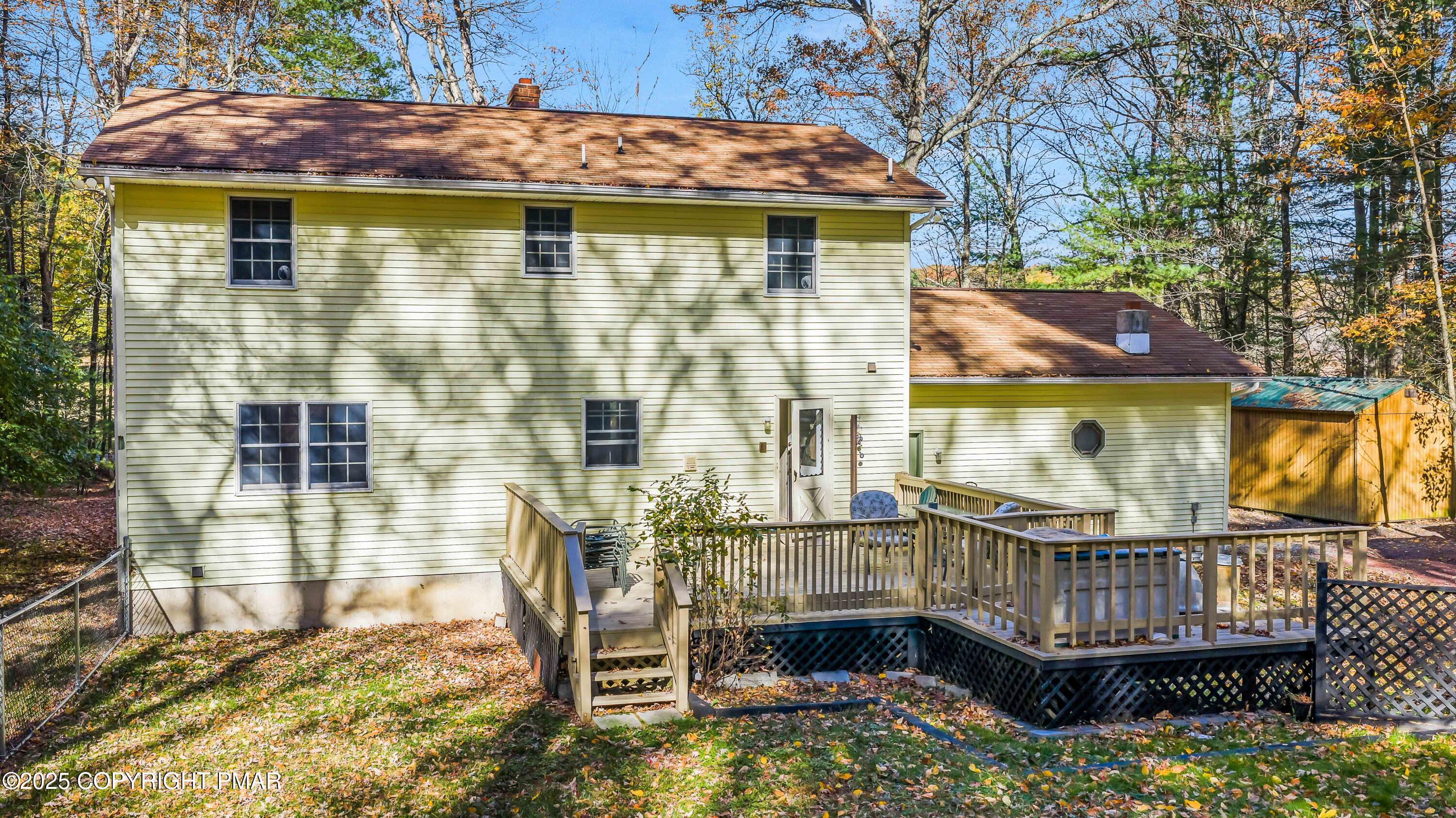 587 Long Mountain Road Effort, PA 18330 - Photo 2 of 29 a view of a brick house with a wooden deck