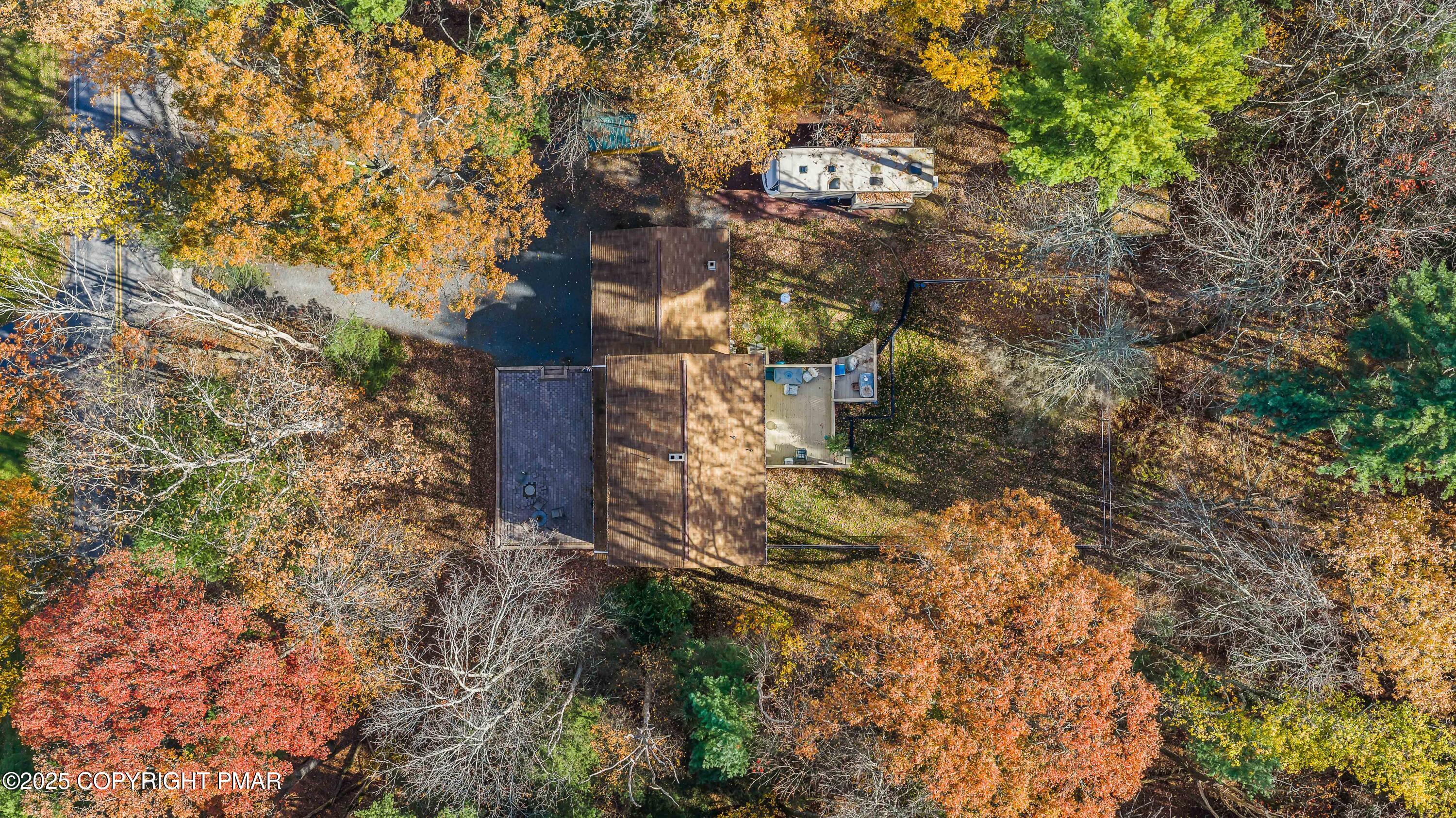 587 Long Mountain Road Effort, PA 18330 - Photo 26 of 29 a street view with large trees