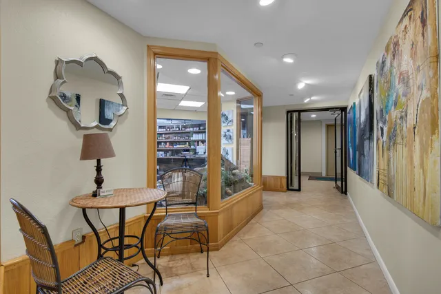 a swimming pool with outdoor seating and yard