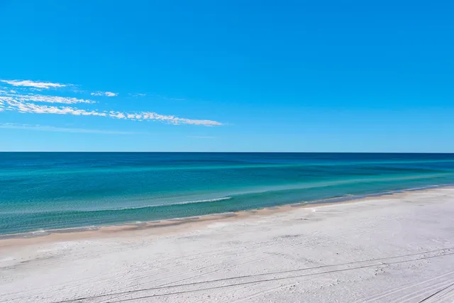 a view of a balcony with chairs