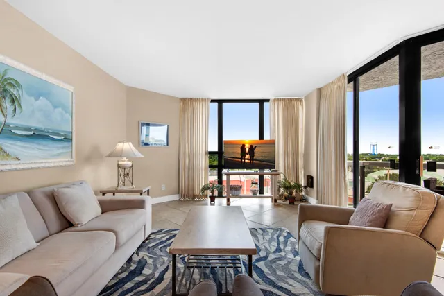 a view of swimming pool with outdoor seating