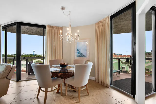 a view of a balcony with chairs